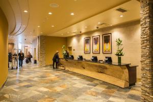 a lobby with a reception desk in a building at Akwesasne Mohawk Casino Resort and Players Inn Hotel -formerly Comfort Inn and Suites Hogansburg NY in Hogansburg