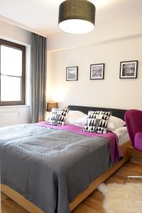 Posteľ alebo postele v izbe v ubytovaní Apartamenty Kora