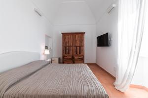 Postel nebo postele na pokoji v ubytování Villa Amì