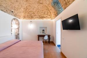 מיטה או מיטות בחדר ב-Villa Amì