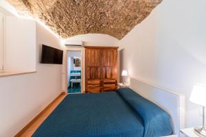 Postel nebo postele na pokoji v ubytování Villa Amì