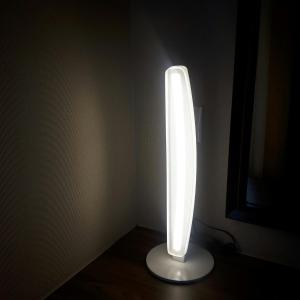 a white lighted lamp in a corner of a room at Nova Hotel Miri in Miri