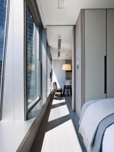 A bed or beds in a room at One96