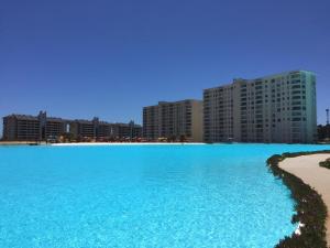 Swimmingpoolen hos eller tæt på Laguna Bahía Algarrobo edificio Océano 406