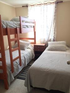 En eller flere senge i et værelse på Laguna Bahía Algarrobo edificio Océano 406 + 5 billeder