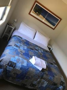 A bed or beds in a room at Bundalong Holiday Resort