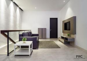 TV a/nebo společenská místnost v ubytování Hutton Suite Hotel Managed by The Ascott Limited