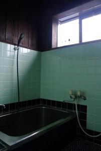 Koupelna v ubytování Hirauchi Hot Spot