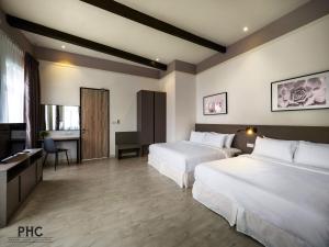 Voodi või voodid majutusasutuse Hutton Central Hotel Managed by The Ascott Limited toas
