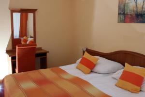 Postel nebo postele na pokoji v ubytování Hotel Napsugar