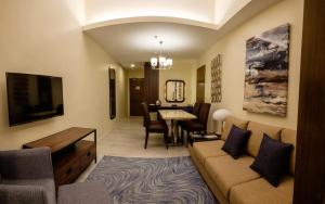 Zona d'estar a One Central Hotel & Suites