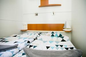 Postel nebo postele na pokoji v ubytování Mobilhome Baška Voda | Kemp Baško Polje