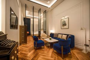 Uma área de estar em Yangon Excelsior