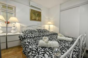 Postel nebo postele na pokoji v ubytování Apartment Markovski
