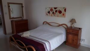 Katil atau katil-katil dalam bilik di Bugibba Homes Suite