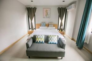Postel nebo postele na pokoji v ubytování Aonang nine poolvilla