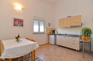 Kuchyň nebo kuchyňský kout v ubytování Apartments Bernarda 1773