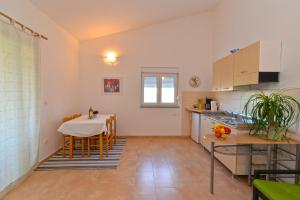 Kuchyň nebo kuchyňský kout v ubytování Apartments Bernarda 1773