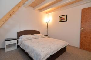 Postel nebo postele na pokoji v ubytování Apartments Bernarda 1773