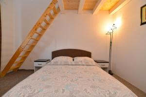 Postel nebo postele na pokoji v ubytování Apartments Bernarda 1773