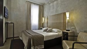 Postelja oz. postelje v sobi nastanitve Intown Luxury House