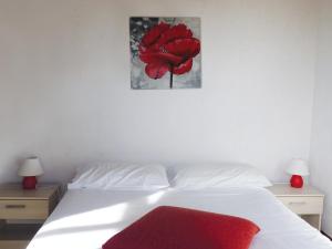Postel nebo postele na pokoji v ubytování Azureva Fournols