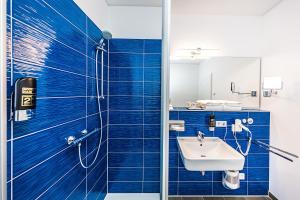 Koupelna v ubytování Best Western Plus Royal Suites