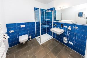 Koupelna v ubytování Best Western Plus Royal Suites