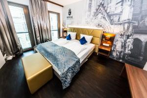 Postel nebo postele na pokoji v ubytování Best Western Plus Royal Suites