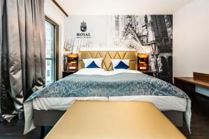 Postel nebo postele na pokoji v ubytování Best Western Plus Royal Suites