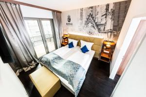 Postel nebo postele na pokoji v ubytování Best Western Plus Royal Suites