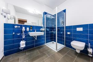 Koupelna v ubytování Best Western Plus Royal Suites