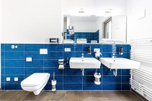 Koupelna v ubytování Best Western Plus Royal Suites
