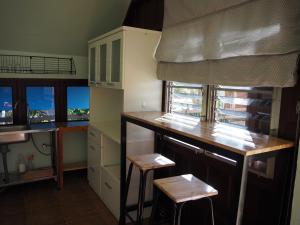 Kjøkken eller kjøkkenkrok på Imm Jai Smile Cottage