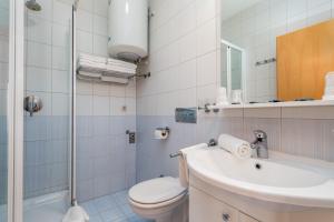 Kúpeľňa v ubytovaní Villas Kampor