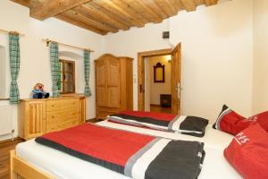 Ein Bett oder Betten in einem Zimmer der Unterkunft Ferienhof Schelchen
