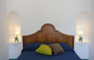 Postel nebo postele na pokoji v ubytování Il Ducato Di Ravello