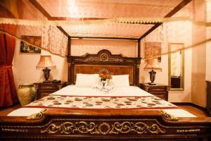 Ein Bett oder Betten in einem Zimmer der Unterkunft Ewan Hotel Sharjah
