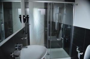 Koupelna v ubytování Hotel Sagittario