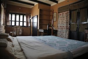 Postel nebo postele na pokoji v ubytování Ram Bhawan Residency