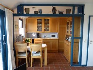 Kuchyň nebo kuchyňský kout v ubytování Appartement Kayser Sylt