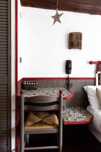 Letto o letti in una camera di Hotel Mignon