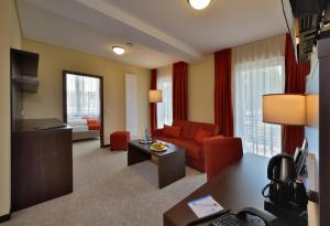 Posezení v ubytování Aribo Hotel