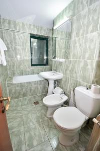 A bathroom at Hotel Green House