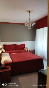 Кровать или кровати в номере Hotel Minerva