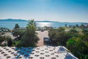 an aerial view of a parking lot and the ocean at Villa Anton in Sukošan
