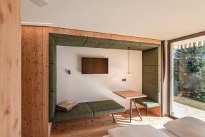 TV a/nebo společenská místnost v ubytování Oberhauser Hütte Rodenecker - Lüsner Alm