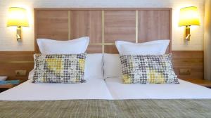 Posteľ alebo postele v izbe v ubytovaní Sumus Hotel Stella and Spa 4S Adults Recommended