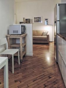 A kitchen or kitchenette at New Capolinea 5 - Apartment