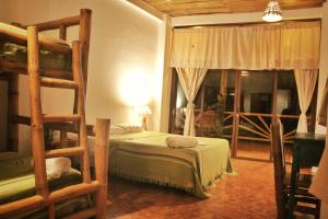 Postel nebo postele na pokoji v ubytování Seaside Garden Ecolodge Mompiche + 37 fotografií